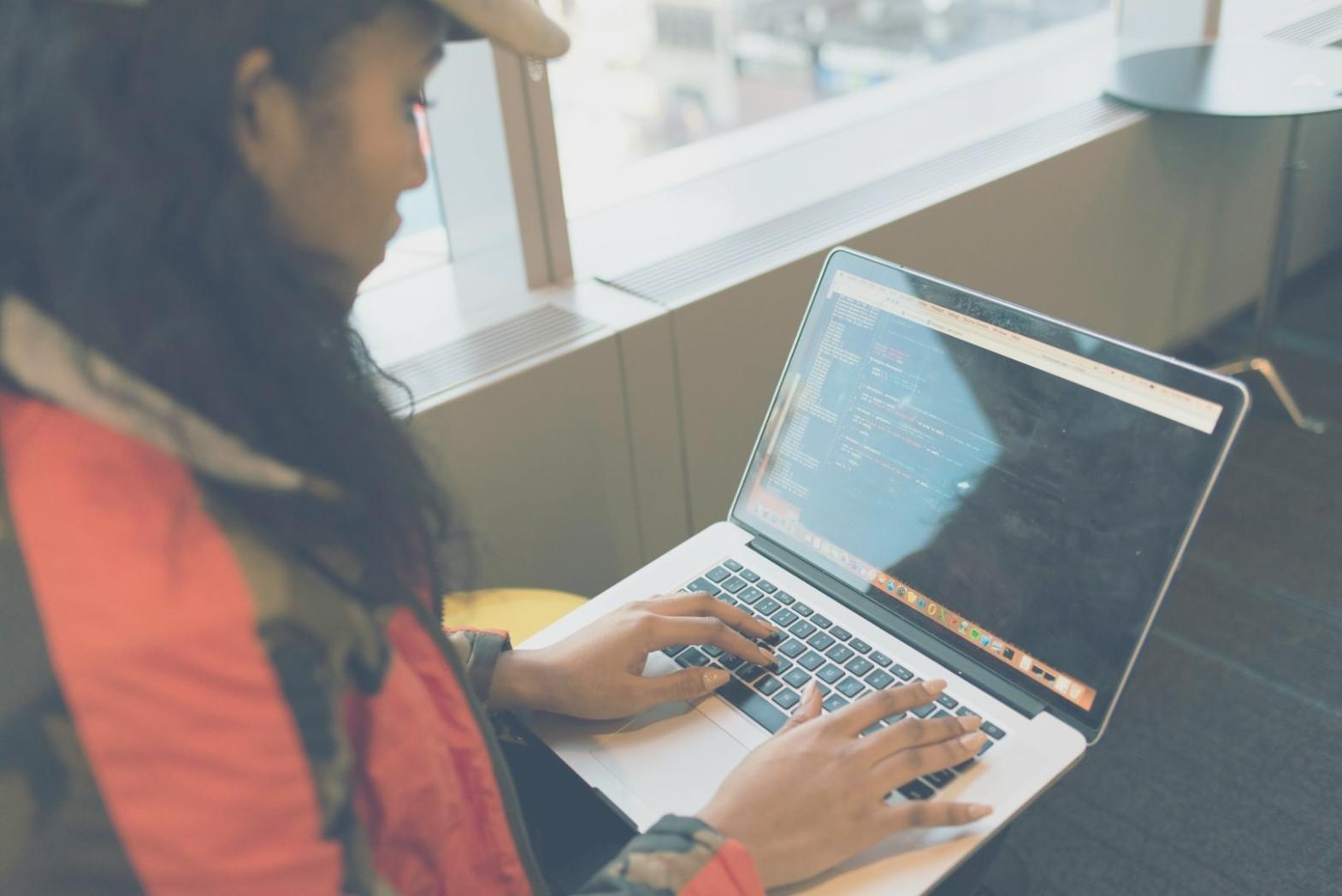 Instructor reviewing neural network architecture with a student during a live session